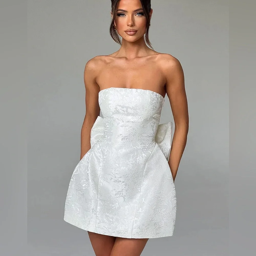 White Babyboo Mimi dress with bow. - Picture 2 of 5